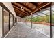 Covered patio features wood ceiling and beautiful brick planters at 140 Margate Mews, Longwood, FL 32779