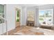 Bright foyer with hardwood floors, a stylish rug, and elegant decor at 1429 Indiana Ave, Winter Park, FL 32789