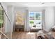 Bright living room featuring a bench seat by the window and lots of natural light at 1429 Indiana Ave, Winter Park, FL 32789