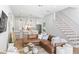Spacious living room seamlessly connected to the kitchen with hardwood floors and stylish decor at 1429 Indiana Ave, Winter Park, FL 32789