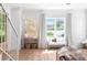 Bright and airy living room featuring hardwood floors and large windows at 1429 Indiana Ave, Winter Park, FL 32789