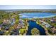 A picturesque aerial view of the lakefront homes showcasing the stunning water views and beautiful community at 1590 Harston Ave, Orlando, FL 32814