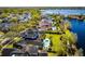 Aerial view of homes near the lakes with mature trees and well-manicured landscaping at 1590 Harston Ave, Orlando, FL 32814