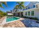 The pool is the focal point of the backyard, surrounded by lush landscaping at 1590 Harston Ave, Orlando, FL 32814