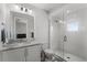 Bathroom features new fixtures, a glass shower, and marble countertops at 1590 Harston Ave, Orlando, FL 32814