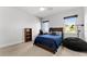 Bright bedroom features new windows, ceiling fan, and plenty of space at 1590 Harston Ave, Orlando, FL 32814
