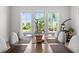 Close up of the dining table with seating for eight and views of the outdoor scenery at 1590 Harston Ave, Orlando, FL 32814
