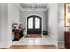 Elegant foyer with marble tile, double doors, sophisticated decor and inviting atmosphere at 1590 Harston Ave, Orlando, FL 32814