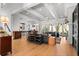 Open-concept living room showcases hardwood floors, fireplace and modern furnishings at 1590 Harston Ave, Orlando, FL 32814