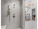 Modern bathroom shower with dual shower heads and light gray ceramic tiles at 1590 Harston Ave, Orlando, FL 32814