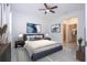 Cozy bedroom features stylish decor, soft lighting, and an en-suite bathroom with a walk-in closet at 15998 Sw 33Rd Avenue Rd, Ocala, FL 34473