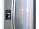 Close-up of a stainless steel refrigerator featuring a water and ice dispenser at 15998 Sw 33Rd Avenue Rd, Ocala, FL 34473