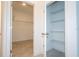 View of two walk-in closets with installed shelving for organizing clothes and personal items at 15998 Sw 33Rd Avenue Rd, Ocala, FL 34473