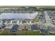 Overhead view of the neighborhood layout with solar panels, showcasing strategic community planning at 1631 Pontiff Pl, Davenport, FL 33896