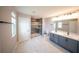 A modern bathroom with a double vanity, a glass-enclosed shower, and marble-look flooring at 1631 Pontiff Pl, Davenport, FL 33896