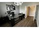 Office featuring a modern desk, ample space, and view of the stairway at 1631 Pontiff Pl, Davenport, FL 33896