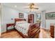 Comfortable bedroom with wood floors and large window offering views at 169 Mallard Ln, Daytona Beach, FL 32119