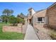 Inviting walkway leading to the home's front entrance with brick accents at 169 Mallard Ln, Daytona Beach, FL 32119