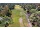 Scenic view of the lush green golf course offering picturesque landscapes and natural surroundings at 169 Mallard Ln, Daytona Beach, FL 32119