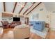 Inviting living room featuring high ceilings with wood beams, and comfortable seating at 169 Mallard Ln, Daytona Beach, FL 32119