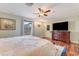 Spacious main bedroom with hardwood floors, natural light and a door to the backyard at 169 Mallard Ln, Daytona Beach, FL 32119
