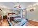 Comfortable main bedroom with hardwood floors, ceiling fan, and lots of natural light at 169 Mallard Ln, Daytona Beach, FL 32119