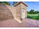 Enclosed brick patio featuring a small storage area with a door, perfect for outdoor relaxation at 169 Mallard Ln, Daytona Beach, FL 32119