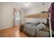 A cozy bedroom featuring a bunk bed and bright, natural light at 2002 Adair St, Ocoee, FL 34761