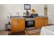 Kitchen with wood cabinets, stainless steel appliances, and granite countertops at 2002 Adair St, Ocoee, FL 34761