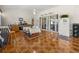 The large kitchen is perfect for entertaining with seating area and stainless steel appliances at 2002 Adair St, Ocoee, FL 34761