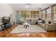 Cozy living room with plush seating and decorative floral accents at 2002 Adair St, Ocoee, FL 34761