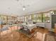 Open living space with neutral furnishings and plenty of natural light at 2002 Adair St, Ocoee, FL 34761
