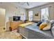 Bedroom with neutral walls, two windows, and a comfortable bed at 202 Napoli Dr # 202, Davenport, FL 33897
