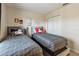 Cozy bedroom showcases two twin beds, closet space, and neutral tones, ideal for a shared space at 202 Napoli Dr # 202, Davenport, FL 33897