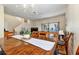 Dining room features a wooden table, ceiling fan, and sliding doors leading to the outdoor space at 202 Napoli Dr # 202, Davenport, FL 33897