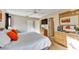 Comfortable bedroom featuring carpet floors, ceiling fan, dresser, and a large bed at 202 Napoli Dr # 202, Davenport, FL 33897