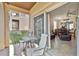 Patio with seating area and sliding glass doors leading to indoor living space at 202 Napoli Dr # 202, Davenport, FL 33897