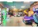 Inviting recreation room offers fun games, a play structure, and space for entertainment, perfect for families at 202 Napoli Dr # 202, Davenport, FL 33897
