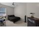 This bedroom includes a comfortable bed, desk, dresser, and ample space, perfect for study and relaxation at 2024 Beardsley Dr, Apopka, FL 32703