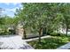 Aerial shot of home with two-car garage, well-maintained landscaping and large driveway at 2024 Beardsley Dr, Apopka, FL 32703