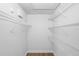 Walk-in closet offering plenty of storage space with shelves on all walls at 2074 S Parkton Dr, Deltona, FL 32725