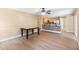 Dining space featuring light wood floors, a neutral color palette, and an open layout to the kitchen at 2074 S Parkton Dr, Deltona, FL 32725