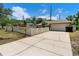 Spacious driveway leading to a two-car garage and a well-kept home exterior at 2074 S Parkton Dr, Deltona, FL 32725