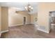 Open living room featuring hardwood floors, recessed lights, and access to other rooms at 2074 S Parkton Dr, Deltona, FL 32725