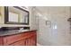 Beautiful bathroom featuring glass enclosed shower and granite countertop vanity at 2108 Shannon Lakes Blvd, Kissimmee, FL 34743