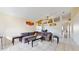 Bright living room with tile flooring, neutral walls, and a ceiling fan at 2108 Shannon Lakes Blvd, Kissimmee, FL 34743