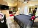 Spacious primary bedroom featuring a private bath and vaulted ceilings at 2108 Shannon Lakes Blvd, Kissimmee, FL 34743