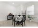 Cozy dining area with modern decor, a window and a stylish table setting at 2524 Datura Loop, St Cloud, FL 34772