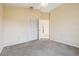 Bright bedroom featuring carpet floors, a closet, and an open doorway at 2598 Ekana Dr, Oviedo, FL 32765