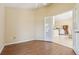 Bright living room features hardwood floors and large french doors leading to other rooms in the house at 2598 Ekana Dr, Oviedo, FL 32765